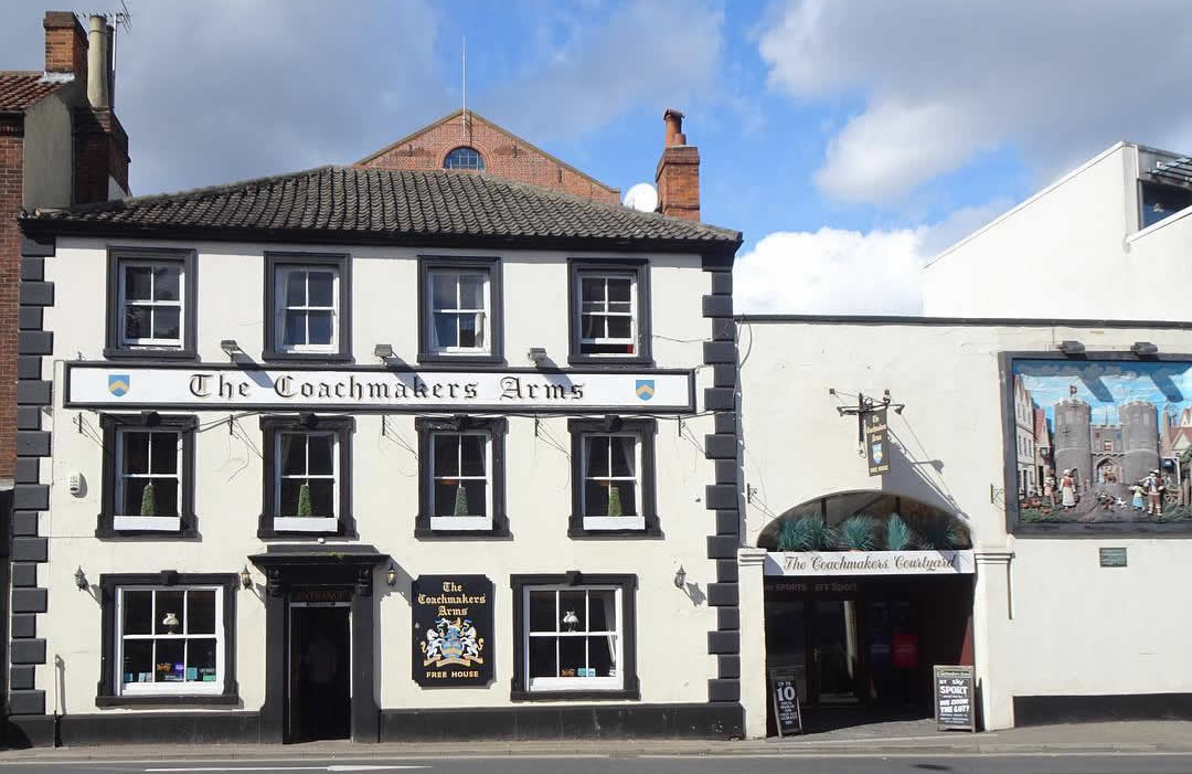 The Coachmakers Arms exterior on St Stephens Road, Norwich, featuring a John Murray-Smith mural